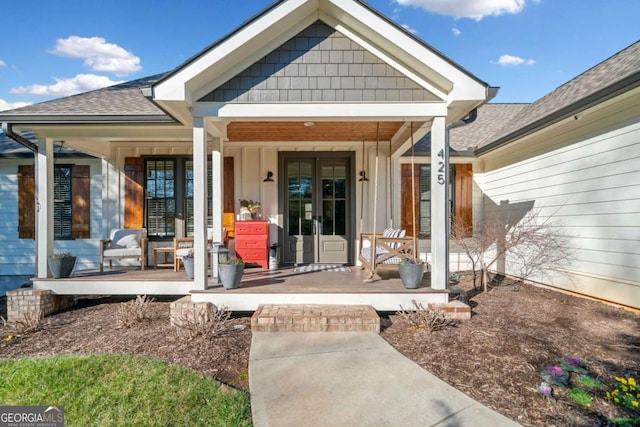 property entrance with covered porch