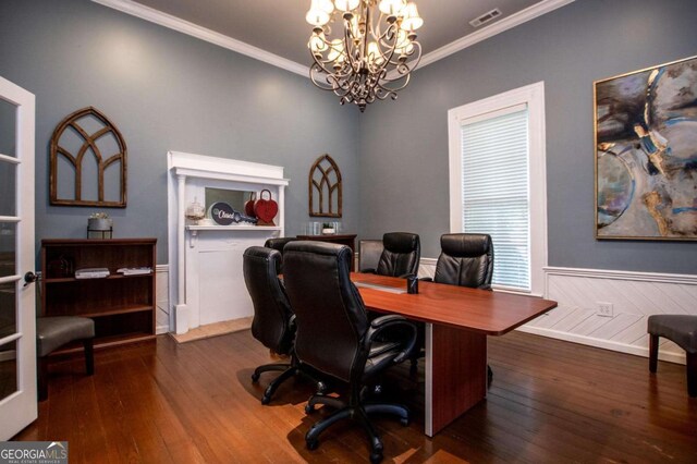 office space featuring dark hardwood / wood-style floors, crown molding, and a chandelier