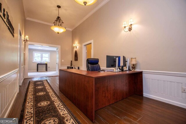 home office featuring dark hardwood / wood-style flooring and crown molding