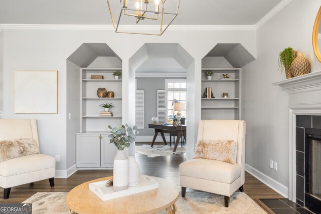 foyer featuring a high ceiling, crown molding, and dark hardwood / wood-style floors