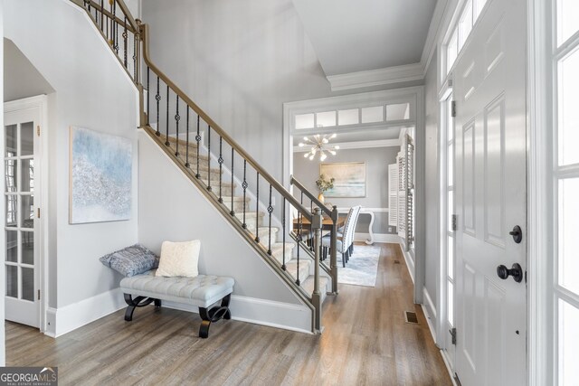 office space with crown molding and hardwood / wood-style floors