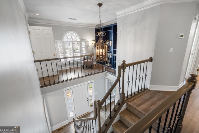 carpeted living room with a tile fireplace and ornamental molding