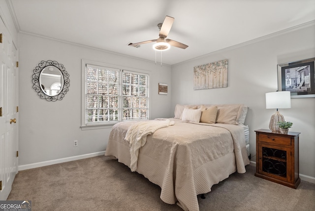 bedroom with ceiling fan, light colored carpet, and ornamental molding