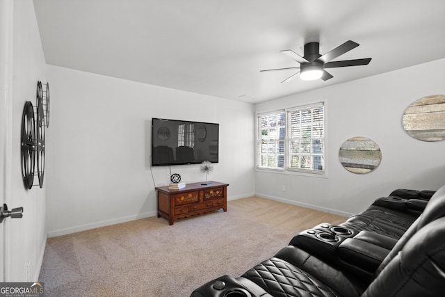 living room with ceiling fan and light carpet