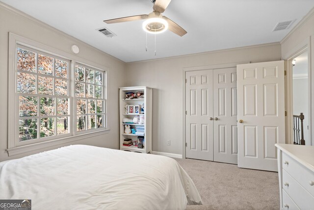 kitchen with light colored carpet, gray cabinets, and ceiling fan