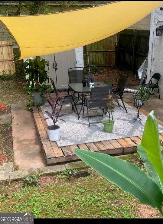 view of patio / terrace featuring a wooden deck