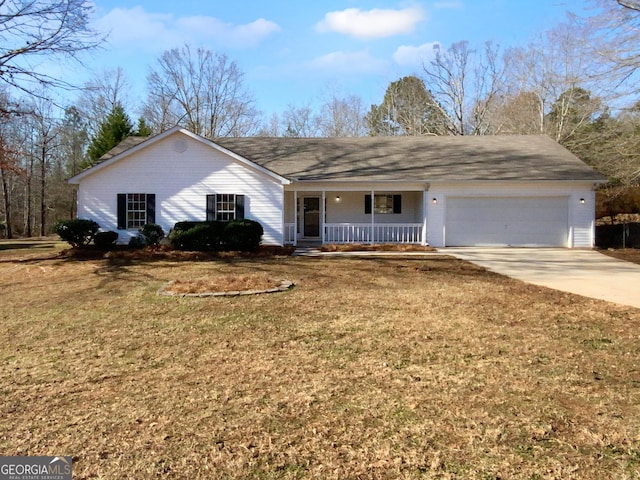 ranch-style home featuring covered porch, a garage, and a front lawn