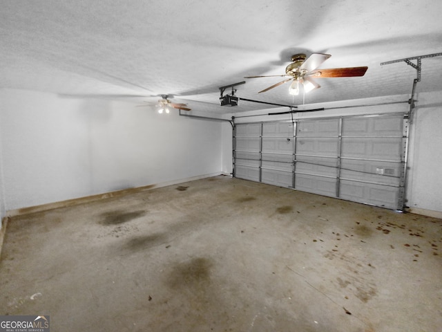 garage featuring a garage door opener and ceiling fan