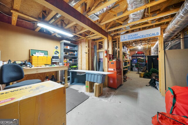 basement with a workshop area