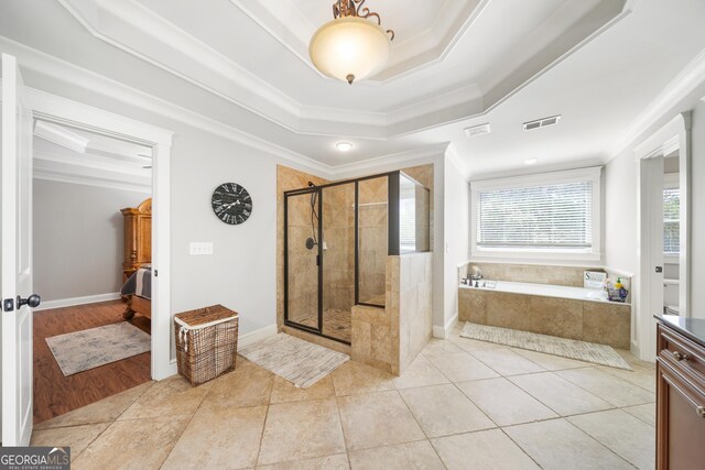 bathroom with separate shower and tub, crown molding, plenty of natural light, and tile patterned flooring