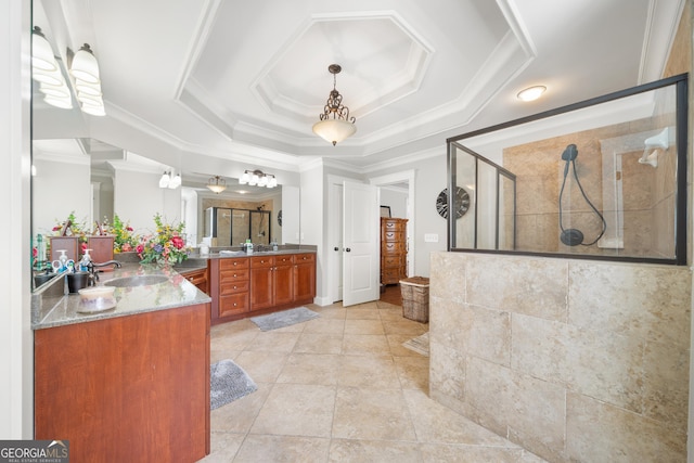 bathroom with vanity, a raised ceiling, tile patterned flooring, ornamental molding, and a shower with shower door