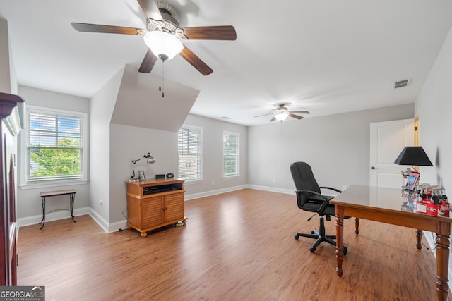 office space featuring wood-type flooring and ceiling fan