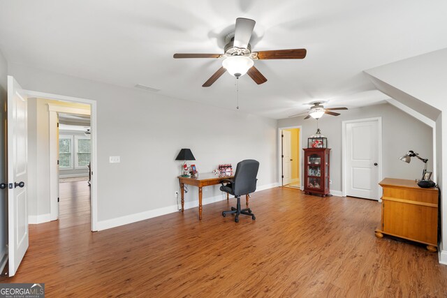 office featuring hardwood / wood-style floors and ceiling fan