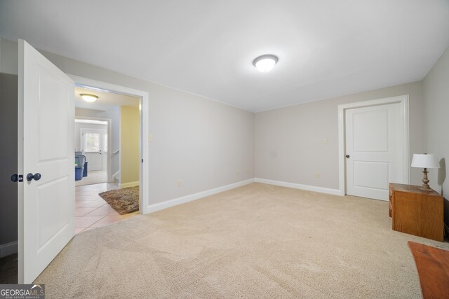 bedroom with light colored carpet