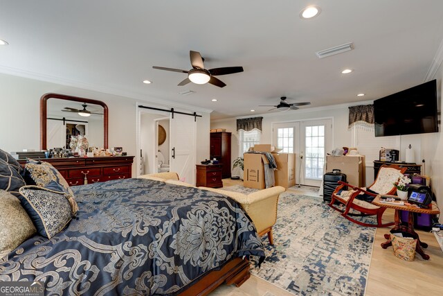 bedroom with ceiling fan, a barn door, access to exterior, and crown molding