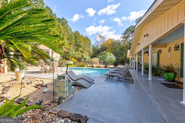 view of pool with a patio