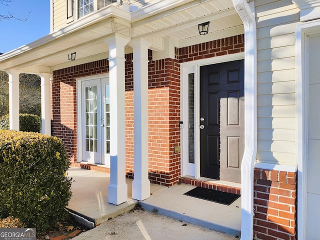 entrance to property with a porch