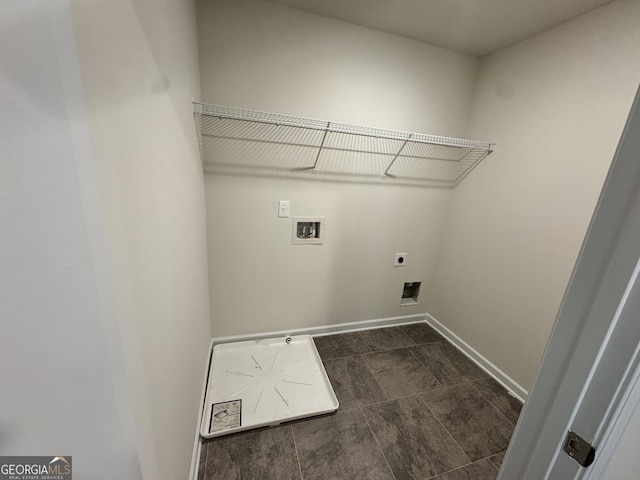 clothes washing area featuring hookup for an electric dryer and hookup for a washing machine