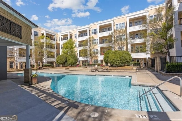 view of pool featuring a patio