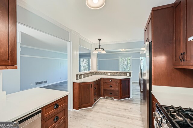 kitchen with hanging light fixtures, light wood-type flooring, ornamental molding, appliances with stainless steel finishes, and kitchen peninsula