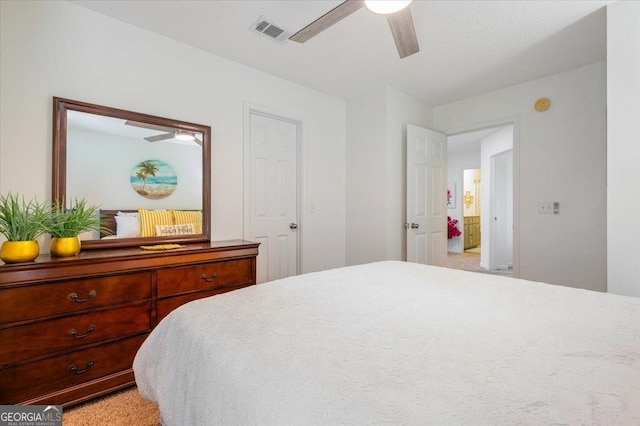 bedroom featuring visible vents and ceiling fan