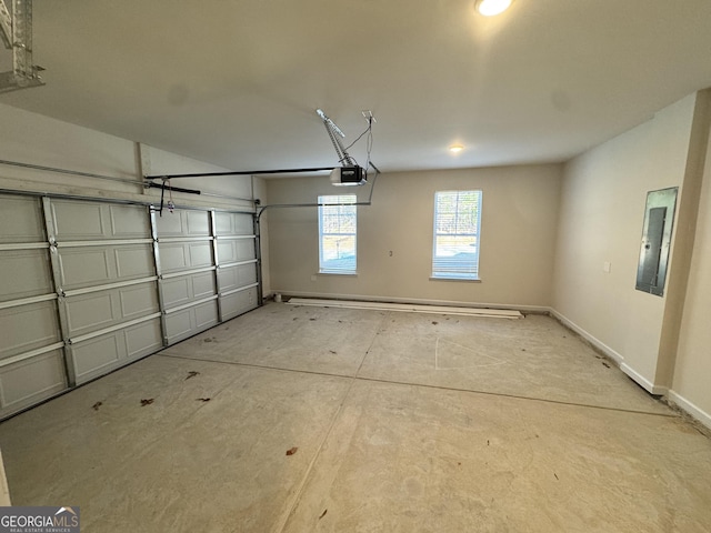 garage with electric panel and a garage door opener