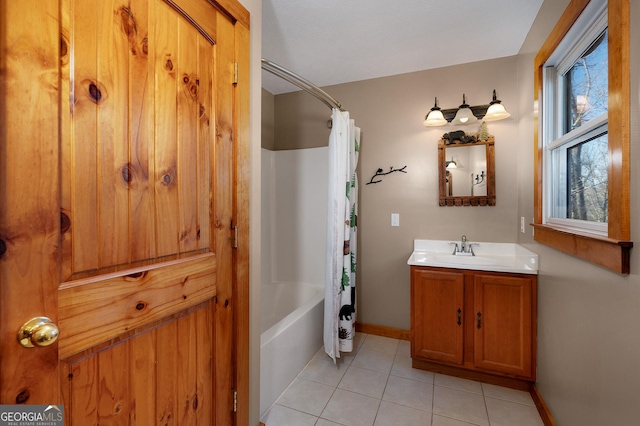 bathroom with tile patterned floors, vanity, and shower / bathtub combination with curtain