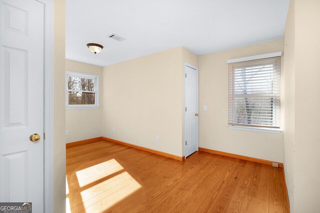 unfurnished bedroom with light hardwood / wood-style flooring