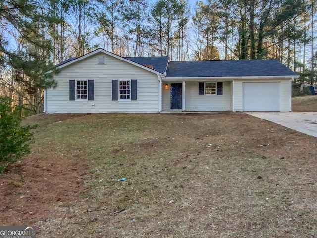 single story home with a front lawn and a garage