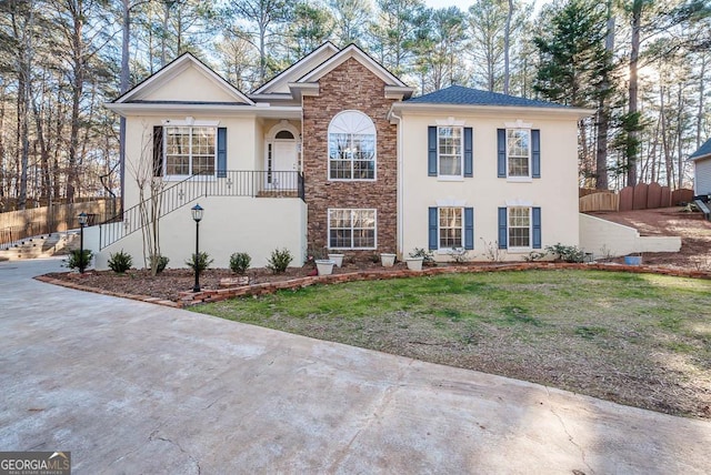 view of front of house with a front lawn