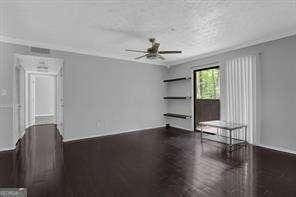 spare room with ceiling fan