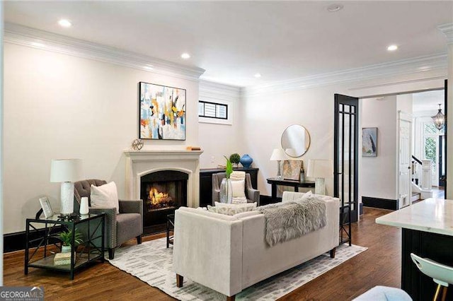 living room featuring crown molding and dark wood-type flooring