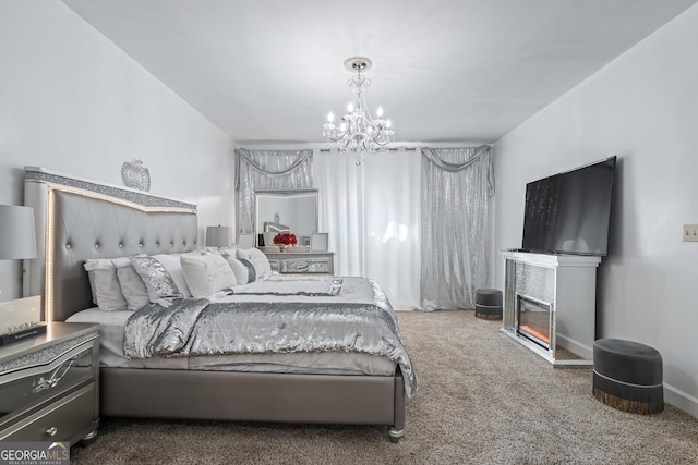 carpeted bedroom with a chandelier