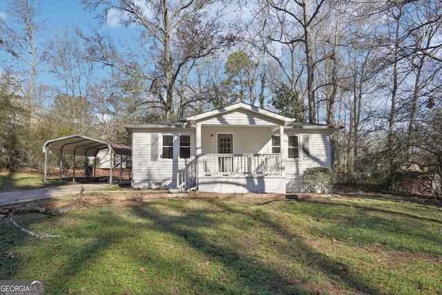 view of front of home with a carport, covered porch, and a front lawn