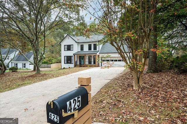 view of front of property featuring a garage