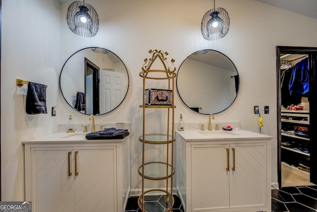 bathroom with vanity and vaulted ceiling