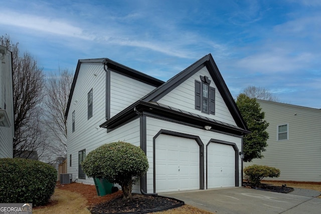 view of property exterior with central AC unit