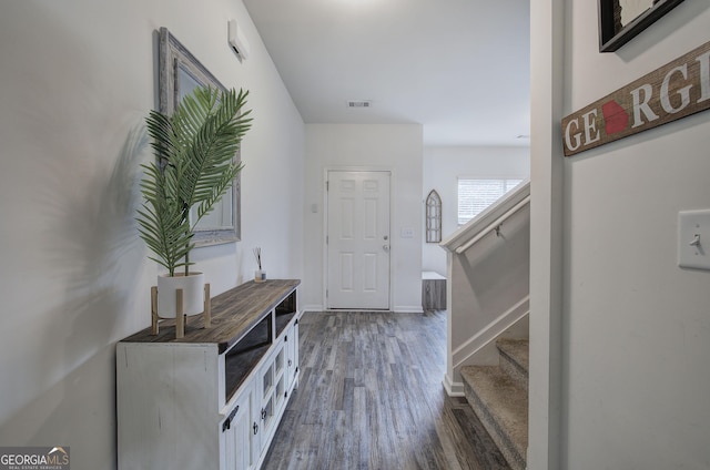 interior space with dark hardwood / wood-style floors