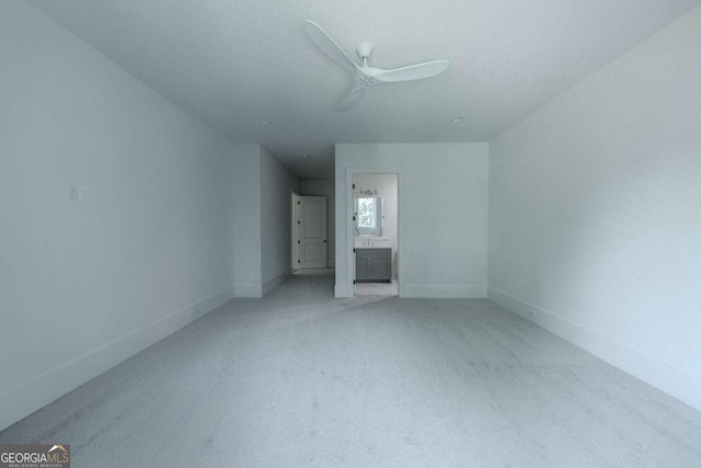 unfurnished bedroom with carpet and ceiling fan