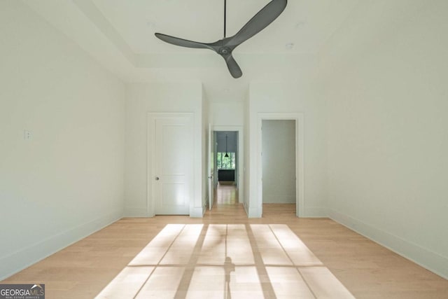 spare room featuring ceiling fan and light wood-type flooring