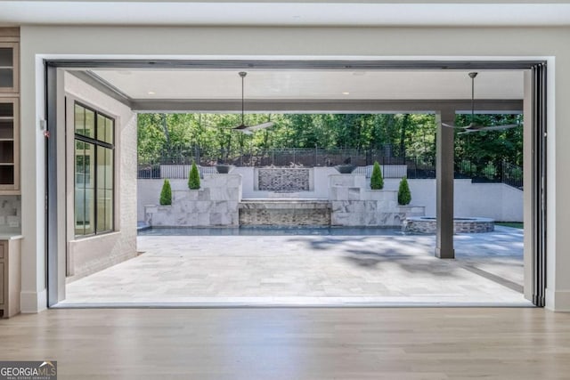 doorway featuring light hardwood / wood-style floors