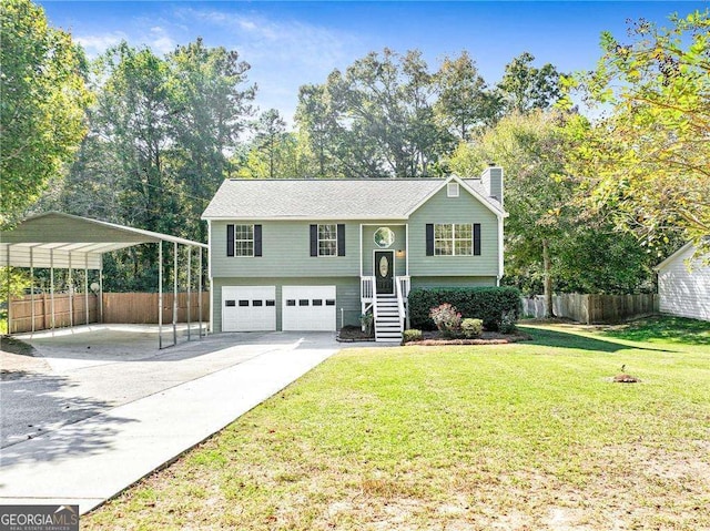 bi-level home featuring a carport and a front yard