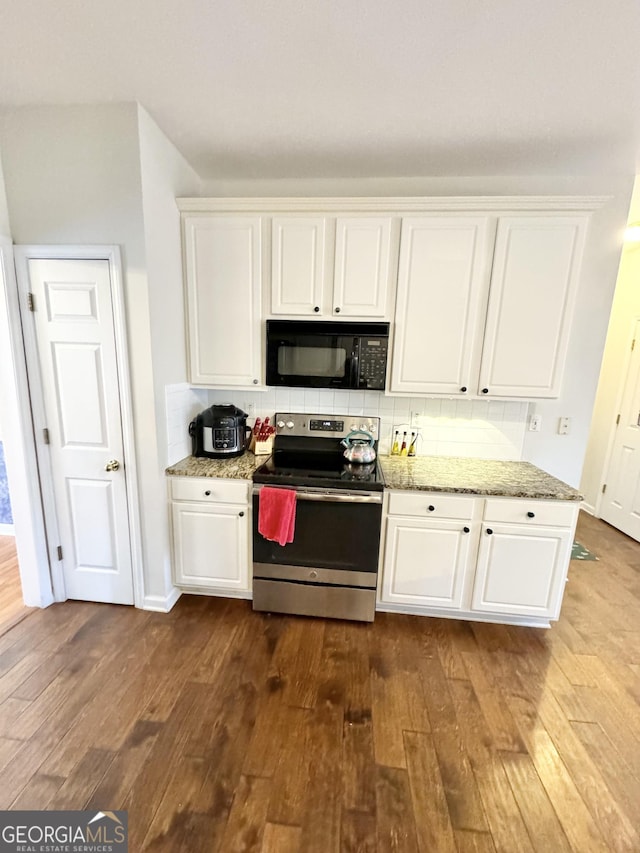 kitchen with white cabinets, dark hardwood / wood-style flooring, and electric stove