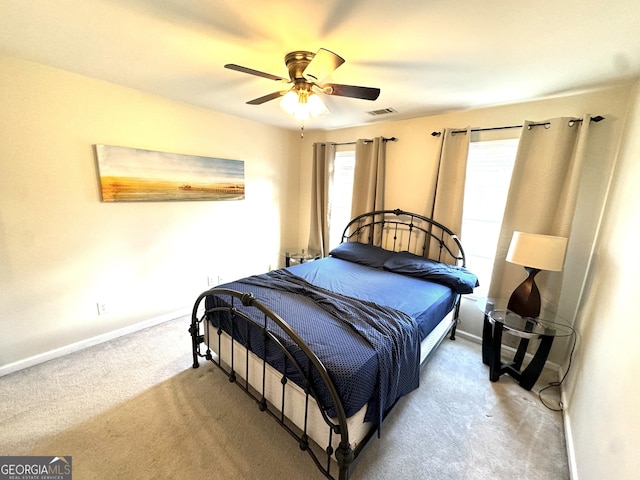 bedroom featuring ceiling fan and carpet floors