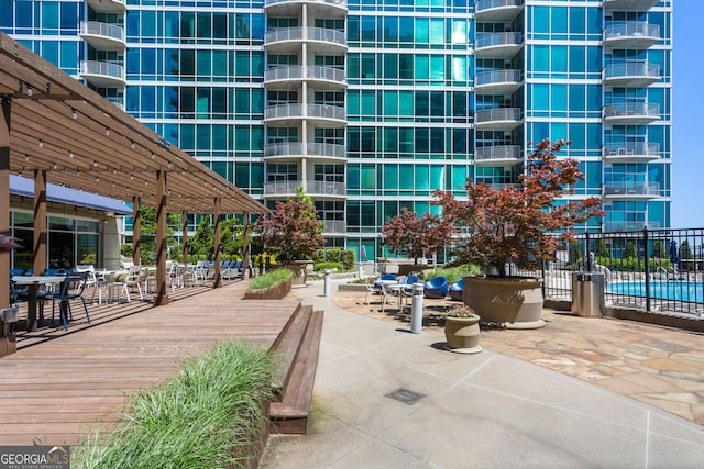 view of property's community featuring a pergola