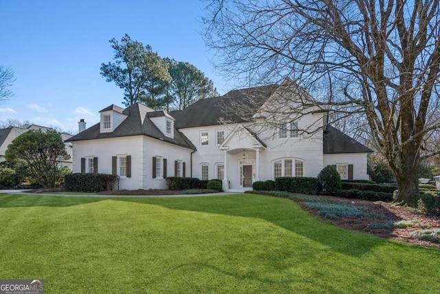 view of front of home with a front yard