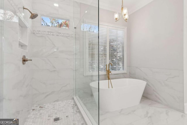 bathroom with shower with separate bathtub, a wealth of natural light, and ornamental molding