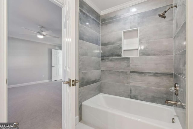 bathroom featuring ceiling fan and tiled shower / bath