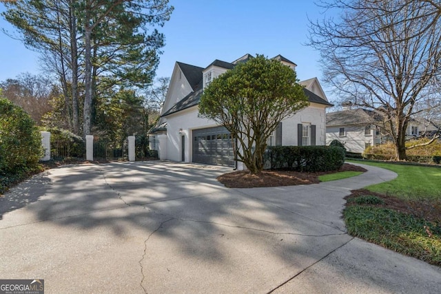 view of property exterior with a garage