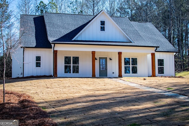 modern farmhouse style home featuring a porch